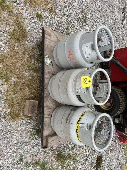 (3) 20lb Forklift Propane Tanks, All Tanks Have Gauges,One Tank Says 1/2 Full, Rolling Cart Included