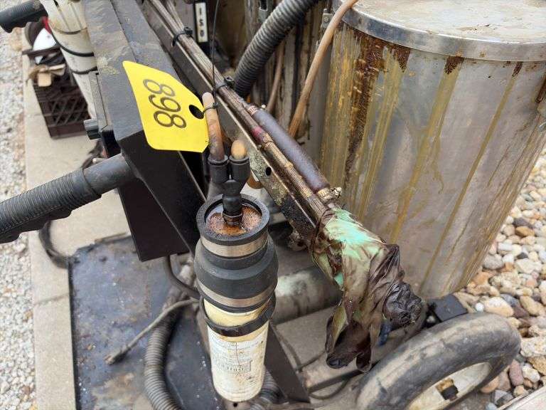 AST GMP-50 2 part caulk/epoxy gun machine, pots in need of deep clean, electric, unknown condition