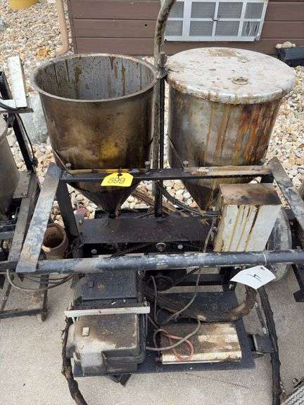 2 part caulk/epoxy Machine, Brand unknown, missing lid on one container, Battery operated, unknown condition, Pots need a good cleaning,