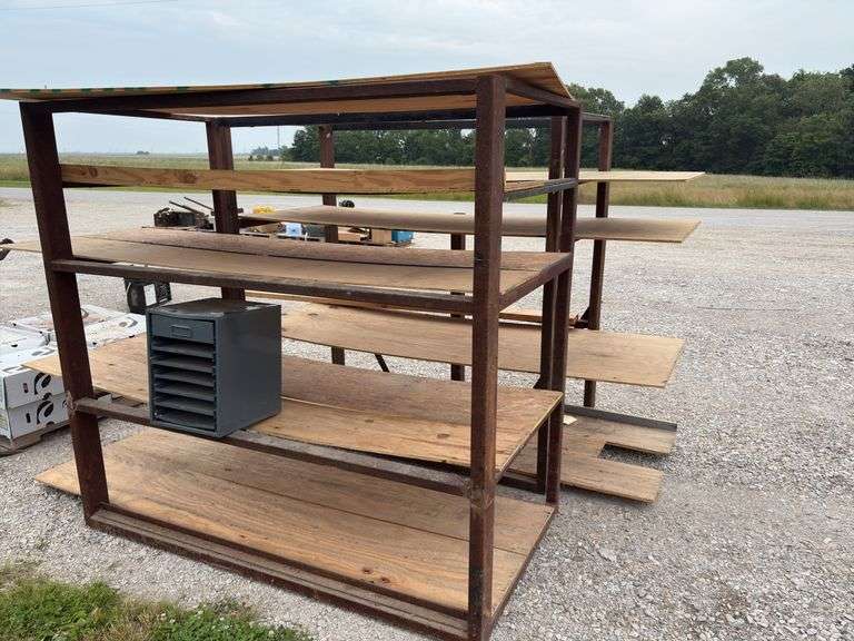 (2) Metal Racks 76” long x 40” wide x 72” tall, plywood on shelves, metal 7 drawer cabinet 131/2” wide x 14” deep x 18” tall