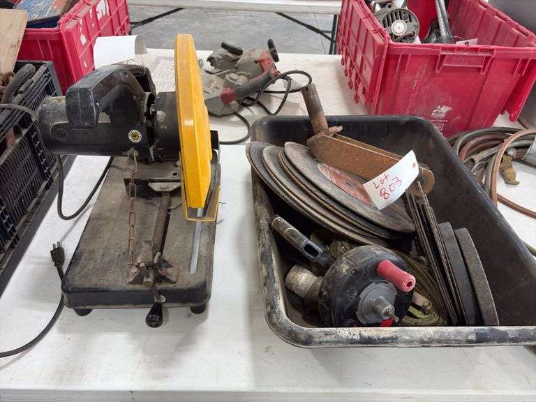 Electric Metal Cutting Chop Saw, blade housing is loose from motor housing, does run, plastic tray with metal cutting blades, grinding wheels, 2’’ ratchet strap,hand held sewer snake,