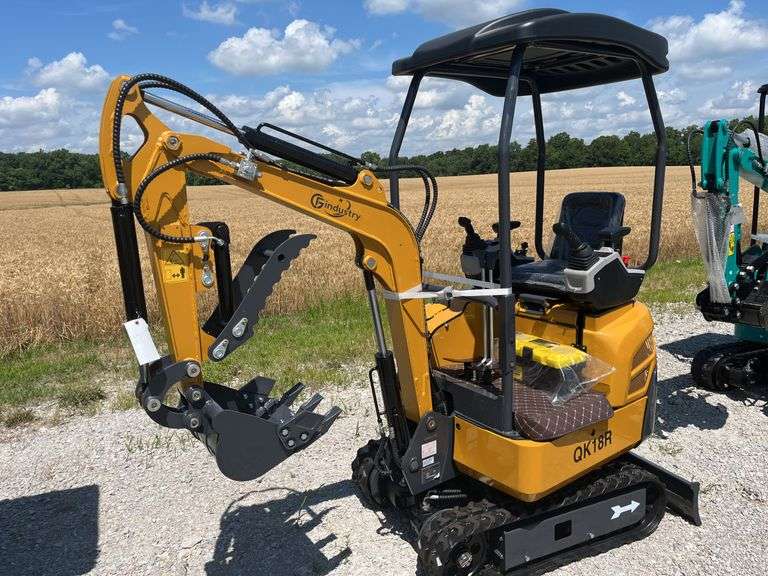 Unused AGT QK18R Mini Excavator, RATO, 13.5HP Gas Engine, Pilot Control System, 16” Bucket, 3 Replaceable Teeth, Auxiliary Hydraulics On Boom, Light On Boom, 7” Rubber Tracks, Canopy, 38.5” Dozer Blade, Rear Door For Easy Access to Engine, Hydraulic Thumb