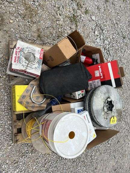 Pallet of First Aid Kits, Propane Cylinders, Boxes of Twine, Partial Roll of Small Rope, Box of Fire Extinguisher, Pump Up Sprayers, Galvanized Tum