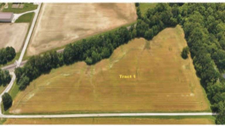12.234 +/- Acres total; South of E 1625 Avenue and North of RR Tracks;9.62 +/- Acres Tillable with some woods, Rural Water Runs Along  Frontage.