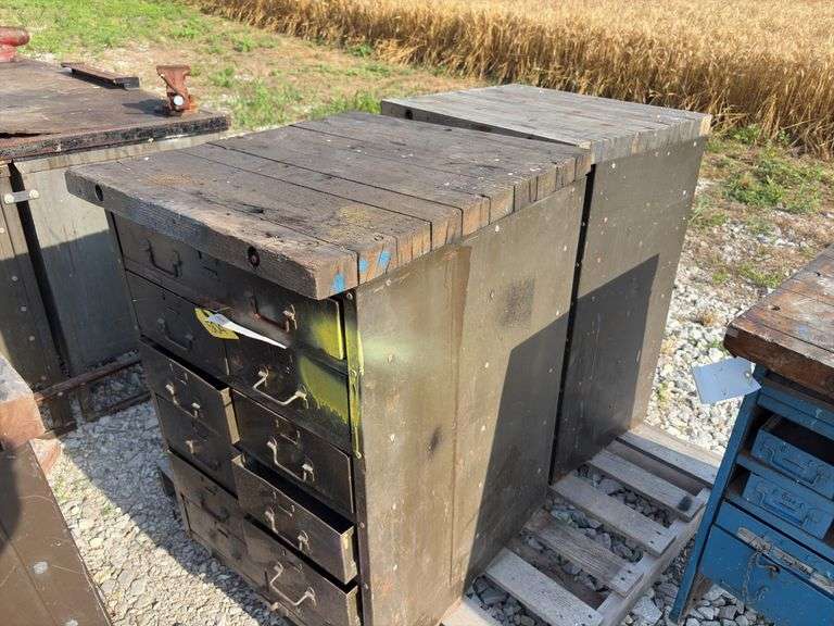 (2) Small Workbenchs, One measures 25” wide X 27” deep X 35 1/2” tall, other one measures 25” wide X 20” deep X 35 1/2” tall, 2x lumber tops, metal drawers in both cabinets, steel framing,