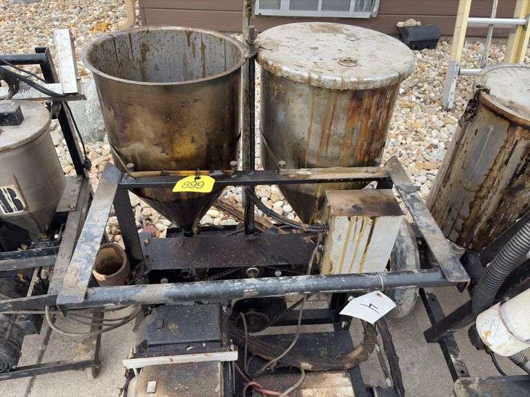 2 part caulk/epoxy Machine, Brand unknown, missing lid on one container, Battery operated, unknown condition, Pots need a good cleaning,