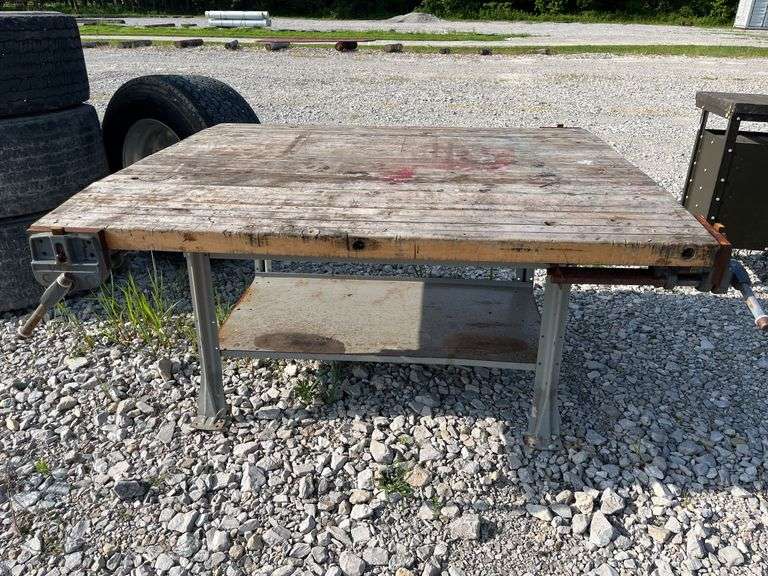 Workbench with (3) Wood Working Vises, Workbench Measures 64” x 55”, Steel Legs and Base Frame, Workbench Leans On One End