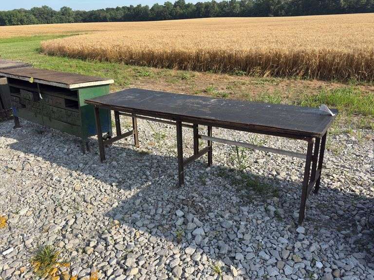 Workbench & work table, workbench measures 78” long x 25” wide x 36” high, Masonite top over 2x lumber, with some metal drawers, work table measures 8’ long X 30” wide X 31” high, Masonite top over 3/4” plywood, steel legs,