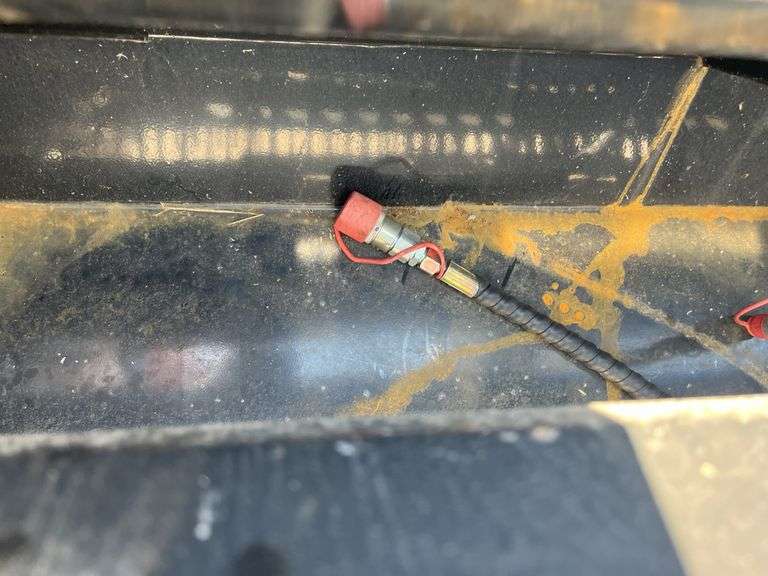 Unused AGT Skid Steer Landscape Rake,
6' wide,
Picks up material as small as 3/4",
Top cover opens hydraulically for ease of dumping,
Skid steer quick attach,
Standard flow hydraulics ,
Model # ECSSLR 72