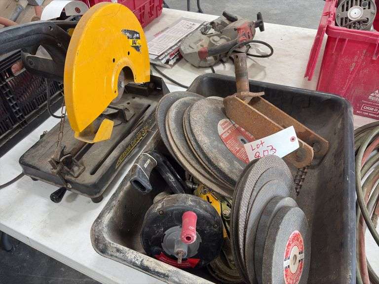 Electric Metal Cutting Chop Saw, blade housing is loose from motor housing, does run, plastic tray with metal cutting blades, grinding wheels, 2’’ ratchet strap,hand held sewer snake,