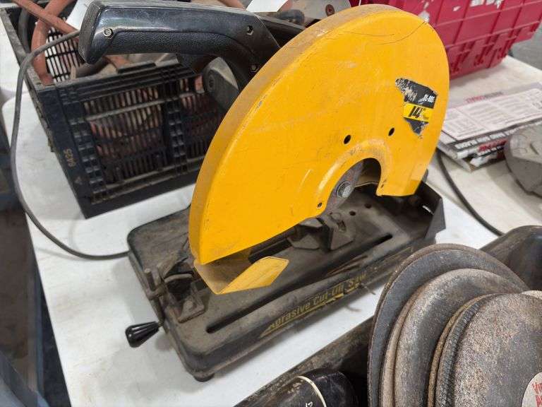 Electric Metal Cutting Chop Saw, blade housing is loose from motor housing, does run, plastic tray with metal cutting blades, grinding wheels, 2’’ ratchet strap,hand held sewer snake,