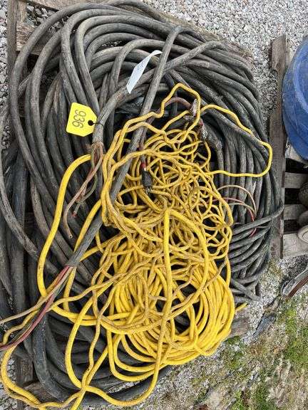 Pallet of 4 Strand Copper Wire, Heavy, Unknown Gauge, one Wire Measures 7/8” Another Measures 1 1/4” Diameter Including Insulation, Also 10Ga Extension Cord approximately 30’, 50’ 12Ga Extension Cord