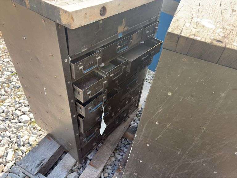 (2) Small Workbenchs, One measures 25” wide X 27” deep X 35 1/2” tall, other one measures 25” wide X 20” deep X 35 1/2” tall, 2x lumber tops, metal drawers in both cabinets, steel framing,