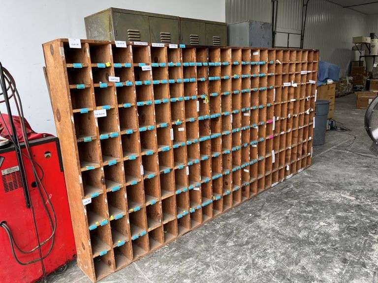 Parts Cabinet, Measures 11’ 7” Long x 5’ 7” Tall x 11.5” Deep, Each Box Measures 5.5” x 5” or 5.5” x 7”, Made Out Of Wood