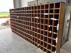 Parts Cabinet, Measures 11’ 7” Long x 5’ 7” Tall x 11.5” Deep, Each Box Measures 5.5” x 5” or 5.5” x 7”, Made Out Of Wood