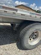 (TITLE) 2005 Ravens 48’ Aluminum Flat Semi Trailer, 22.5’S On Aluminum Outer Rims, 10’ Spread Axel, Aluminum Frame, Brakes In Good Shape (70%), Professional Weld Repair (Pictured), No Cracks On Frame, Air Ride Suspension, 102” Wide, Title In Hand,  5 th Wheel Pin Looks Good,Selling To Dissolve A Trucking Company Partnership.