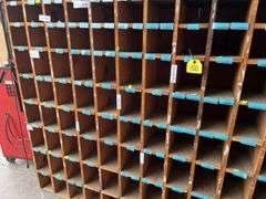 Parts Cabinet, Measures 11’ 7” Long x 5’ 7” Tall x 11.5” Deep, Each Box Measures 5.5” x 5” or 5.5” x 7”, Made Out Of Wood