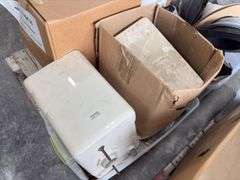 (4)Boxes of 3” Clevis Hangers approx 25 in a box, (2) Boxes of 1 1/2” Clevis Hangers approx 100 in a box, plastic tote of rubber witches hats pipe flashing for roof, plastic tote of a toilet tank,  slip joint connectors