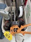 Bucket of caulk Guns, regular, quart and 2 part epoxy guns,