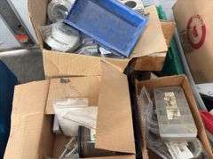 Coupling Kit bowl to tank, Valve Replacement seal for toilet tank, brass threaded clean out  covers, brass water meter, 9” AC/DC TV-VCR Combo, unknown condition, 2 gallon pump up sprayer, box of rubber gaskets, (4) wall clocks, box of various size bushings,