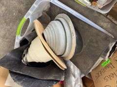 (4)Boxes of 3” Clevis Hangers approx 25 in a box, (2) Boxes of 1 1/2” Clevis Hangers approx 100 in a box, plastic tote of rubber witches hats pipe flashing for roof, plastic tote of a toilet tank,  slip joint connectors