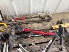 (2) Floor Jacks, 1 missing handle, (3) 4 way lug wrench standard and metric, (2) bicycle air pumps, (2) crow bars, (3) bottle jacks, flood light,