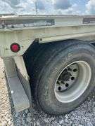 (TITLE) 2005 Ravens 48’ Aluminum Flat Semi Trailer, 22.5’S On Aluminum Outer Rims, 10’ Spread Axel, Aluminum Frame, Brakes In Good Shape (70%), Professional Weld Repair (Pictured), No Cracks On Frame, Air Ride Suspension, 102” Wide, Title In Hand,  5 th Wheel Pin Looks Good,Selling To Dissolve A Trucking Company Partnership.