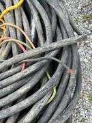 Pallet of 4 Strand Copper Wire, Heavy, Unknown Gauge, one Wire Measures 7/8” Another Measures 1 1/4” Diameter Including Insulation, Also 10Ga Extension Cord approximately 30’, 50’ 12Ga Extension Cord