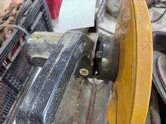 Electric Metal Cutting Chop Saw, blade housing is loose from motor housing, does run, plastic tray with metal cutting blades, grinding wheels, 2’’ ratchet strap,hand held sewer snake,