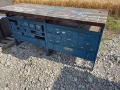 (2) Workbenches w/ 2x wood tops, measure 6’ long X 25 1/2” wide X 36” tall, sliding steel drawers, cabinet is made of steel,