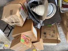 (4)Boxes of 3” Clevis Hangers approx 25 in a box, (2) Boxes of 1 1/2” Clevis Hangers approx 100 in a box, plastic tote of rubber witches hats pipe flashing for roof, plastic tote of a toilet tank,  slip joint connectors