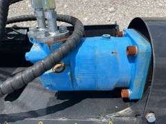 Unused AGT Skid Steer Landscape Rake,
6' wide,
Picks up material as small as 3/4",
Top cover opens hydraulically for ease of dumping,
Skid steer quick attach,
Standard flow hydraulics ,
Model # ECSSLR 72