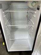 Dorm Size Refrigerator, Black in Color, Does Run, 31.5” Tall x 17.5” Wide x 19” Deep, Small Dents On Top