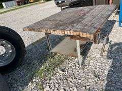 Workbench with (3) Wood Working Vises, Workbench Measures 64” x 55”, Steel Legs and Base Frame, Workbench Leans On One End