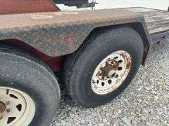(TITLE) Corn Pro Pintle Hitch Trailer, 84” Wide 20’ Long, 7.50R16LT Tires, 8 Hole Rims, Fair To Good Wooden Deck, Tread Plate Fenders,