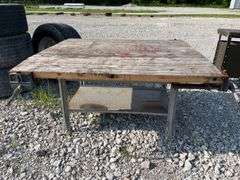 Workbench with (3) Wood Working Vises, Workbench Measures 64” x 55”, Steel Legs and Base Frame, Workbench Leans On One End