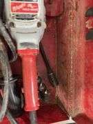 Milwaukee Heavy Duty Hole Hawg, 1 1/8” & 2” wood bits, does run, metal case