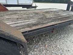 (TITLE) Corn Pro Pintle Hitch Trailer, 84” Wide 20’ Long, 7.50R16LT Tires, 8 Hole Rims, Fair To Good Wooden Deck, Tread Plate Fenders,