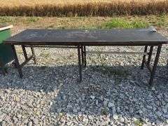 Workbench & work table, workbench measures 78” long x 25” wide x 36” high, Masonite top over 2x lumber, with some metal drawers, work table measures 8’ long X 30” wide X 31” high, Masonite top over 3/4” plywood, steel legs,