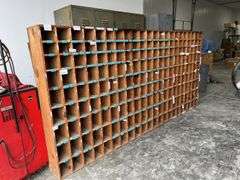 Parts Cabinet, Measures 11’ 7” Long x 5’ 7” Tall x 11.5” Deep, Each Box Measures 5.5” x 5” or 5.5” x 7”, Made Out Of Wood