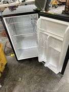 Dorm Size Refrigerator, Black in Color, Does Run, 31.5” Tall x 17.5” Wide x 19” Deep, Small Dents On Top