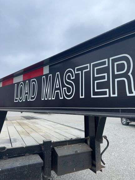 (TITLE) 2002 Load Master Gooseneck Flat Trailer, TITLE, 15’ Deck W/ 10’ Hydraulic Beaver Tail, 25’ Overall Length, Matching Delta LT 235/85/16 Radials 90% Tread, Good Oak Deck, New Spare Tire, Dual Axel W/Singles, Brakes Work, Selling For A Retiring Farmer.