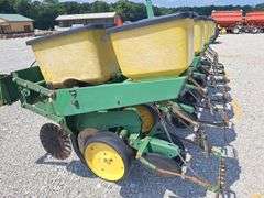 John Deere 7000 6-Row Planter, No-Till Coulters, Insecticide Boxes, Row Harrows, Good Boxes, Bean Cups, Corn Meters, Good Tires, Comes With JD Monitor in Unknown Condition.