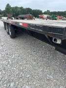 (TITLE) 2002 Load Master Gooseneck Flat Trailer, TITLE, 15’ Deck W/ 10’ Hydraulic Beaver Tail, 25’ Overall Length, Matching Delta LT 235/85/16 Radials 90% Tread, Good Oak Deck, New Spare Tire, Dual Axel W/Singles, Brakes Work, Selling For A Retiring Farmer.