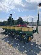 John Deere 7000 6-Row Planter, No-Till Coulters, Insecticide Boxes, Row Harrows, Good Boxes, Bean Cups, Corn Meters, Good Tires, Comes With JD Monitor in Unknown Condition.