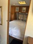 1998 Jayco  28’ Camper Trailer, Everything Works Per Consignor, Window Seals Recaulked,Good Tires, New Spare Tire, Eagle Model, Double Bed, (2) Single Bunk Beds, Above Average Condition For Its Age. Been Used By A Smoker.