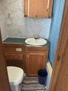 1998 Jayco  28’ Camper Trailer, Everything Works Per Consignor, Window Seals Recaulked,Good Tires, New Spare Tire, Eagle Model, Double Bed, (2) Single Bunk Beds, Above Average Condition For Its Age. Been Used By A Smoker.