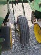 John Deere 7000 6-Row Planter, No-Till Coulters, Insecticide Boxes, Row Harrows, Good Boxes, Bean Cups, Corn Meters, Good Tires, Comes With JD Monitor in Unknown Condition.