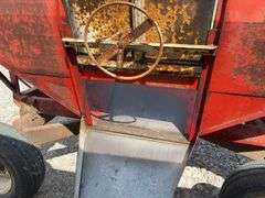 Huskee Running Gear, Flow EZ 250 Bushel Gravity Wagon, Tires hold Air, Tread 20%, Floor is good, unloading door works,
