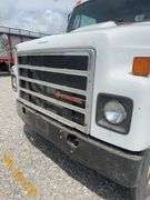 (TITLE) 1988 International S 2300 Tandem Grain Truck, 466 Diesel Engine, Air Brakes, Straight 7 Speed Transmission, 8’ Wide, 10’2” Tall, 26’ Long, Empty Weight Estimated 19,000-20,000#, 11R22.5 Tires (Good), Twin Screw, Spring Suspension ,Clutch And Front End Work Less Than 500 Miles Ago, 18’ Metal Grain Bed W/ Steel Floor (Nice), 64” Steel Sides, Single Post Hoist, Rust Free Frame And Cross Members,  Been Shedded Several Years, Great Tandem Truck, Miles Unknown’s